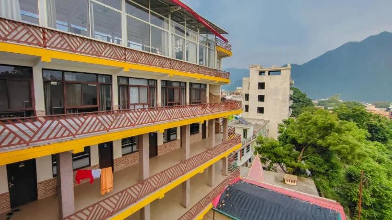 a view of a building with a balcony at Hotel Dream Catcher in Rishīkesh