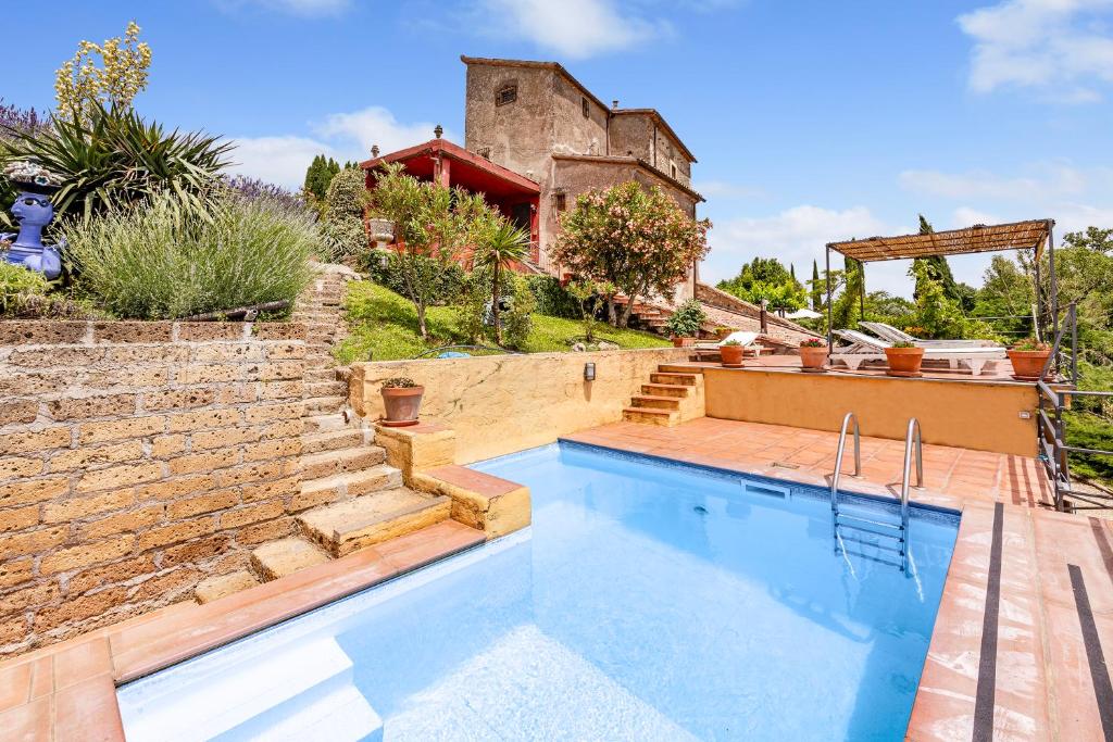 The swimming pool at or close to Torre Del Melograno With Heated Pool - Happy Rentals