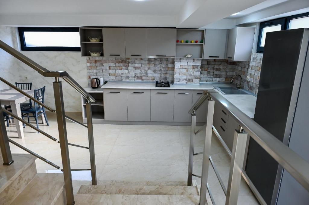 Kuchyň nebo kuchyňský kout v ubytování Hotel K124