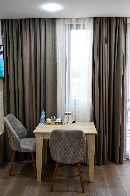 TV a/nebo společenská místnost v ubytování Hotel K124