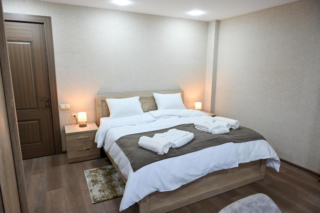 Postel nebo postele na pokoji v ubytování Hotel K124