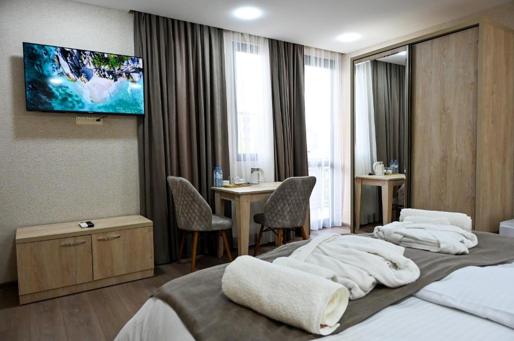 Postel nebo postele na pokoji v ubytování Hotel K124