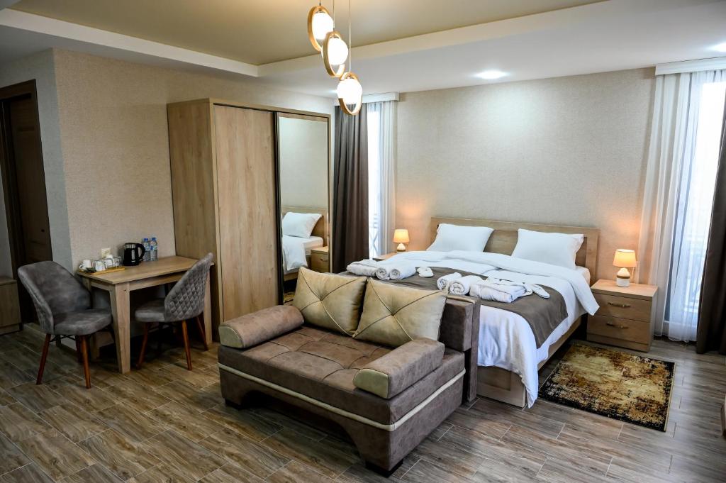 Postel nebo postele na pokoji v ubytování Hotel K124