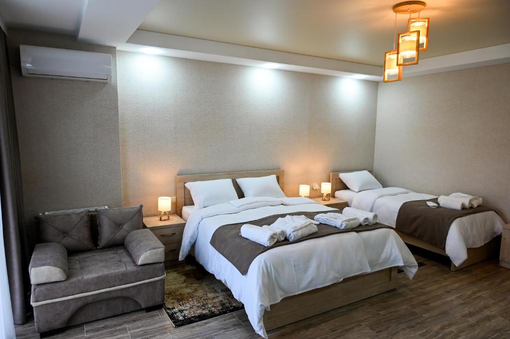 Postel nebo postele na pokoji v ubytování Hotel K124