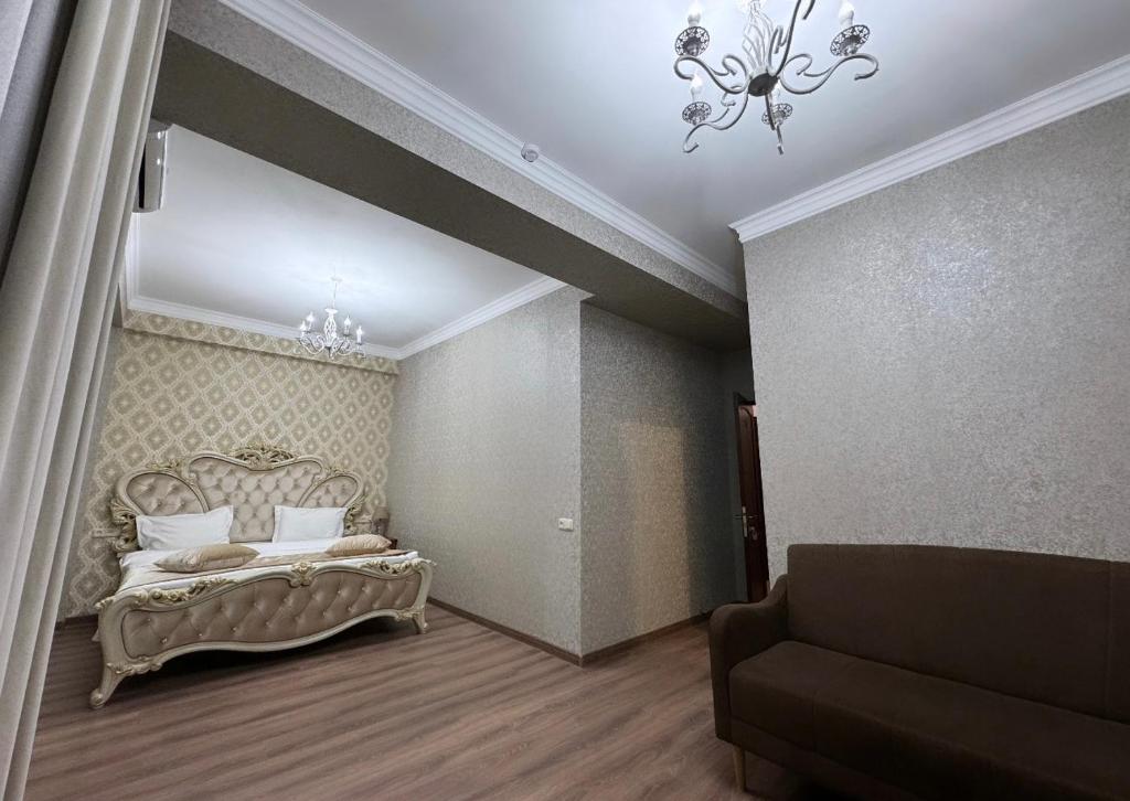 Postel nebo postele na pokoji v ubytování Armenia Hotel