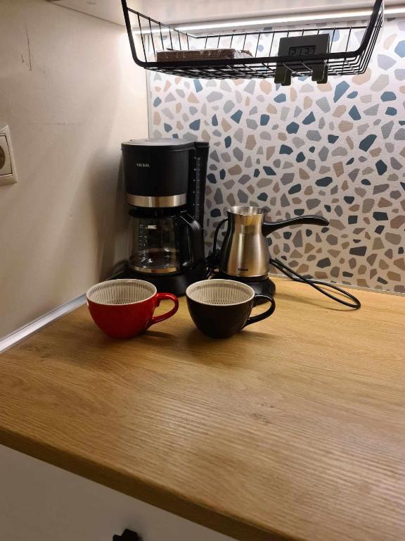 Kuchyň nebo kuchyňský kout v ubytování 48 Central Nest
