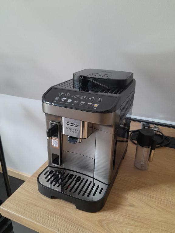 CabanA Oscar في بورشا: وجود آلة صنع القهوة على طاولة
