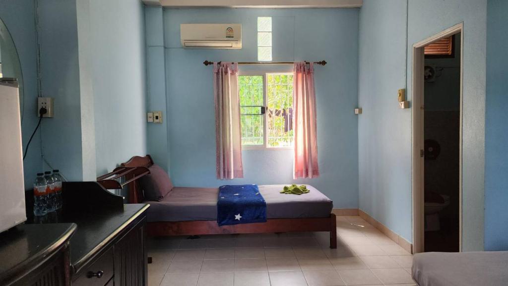 Posezení v ubytování Sarin Guesthouse สาริน