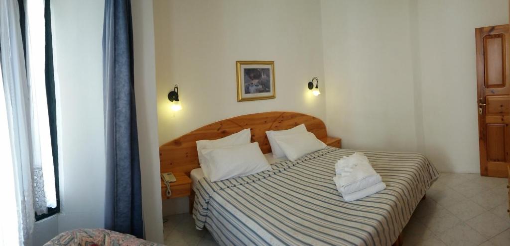 Postel nebo postele na pokoji v ubytování Villa Xemxija