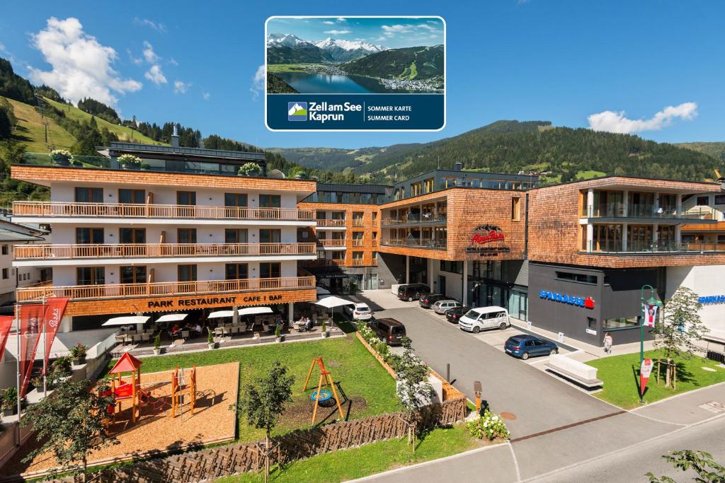 a view of a city with buildings and a street at AlpenParks Hotel & Apartment Central Zell am See in Zell am See