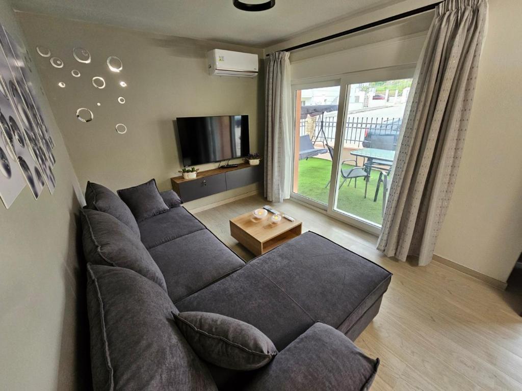 Posezení v ubytování Welcome Apartment, Nea Peramos