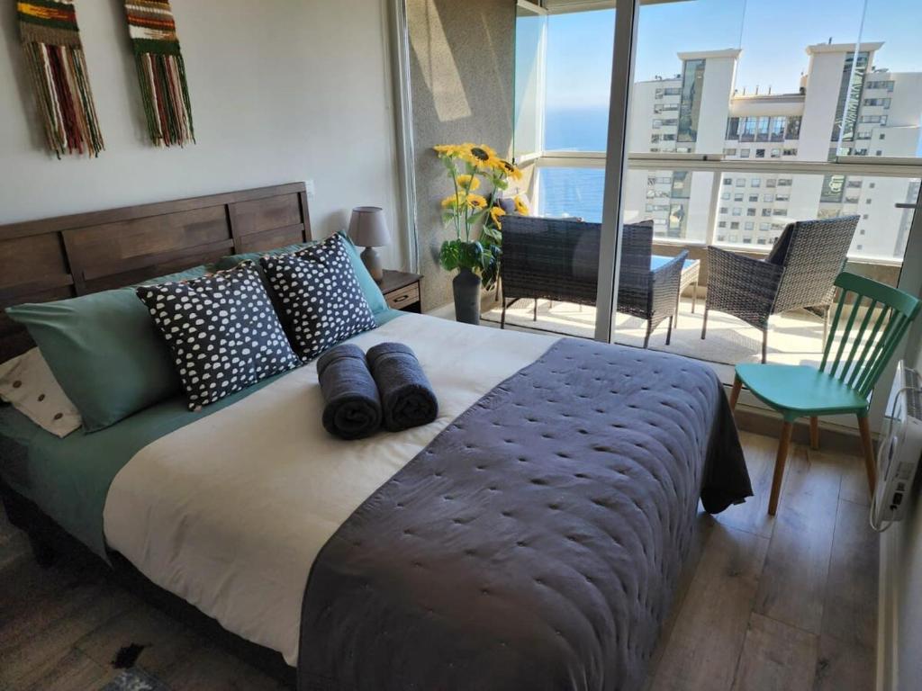 Кровать или кровати в номере HOM I Dúplex de Lujo en Concón con Terraza vista al mar 0421