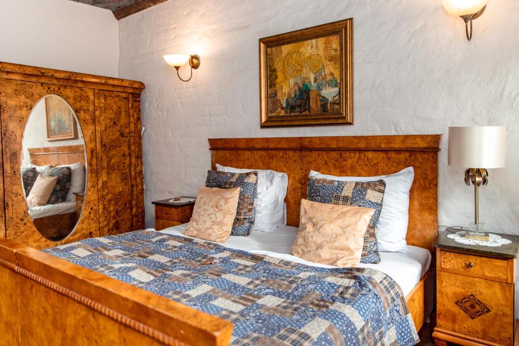 Posteľ alebo postele v izbe v ubytovaní Apartamenty Molus na Rynku Staromiejskim