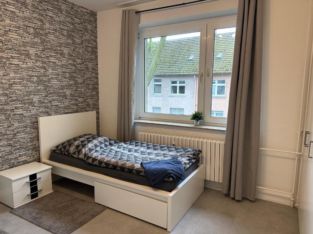 Кровать или кровати в номере Apartment für Familien, Urlauber und Monteure