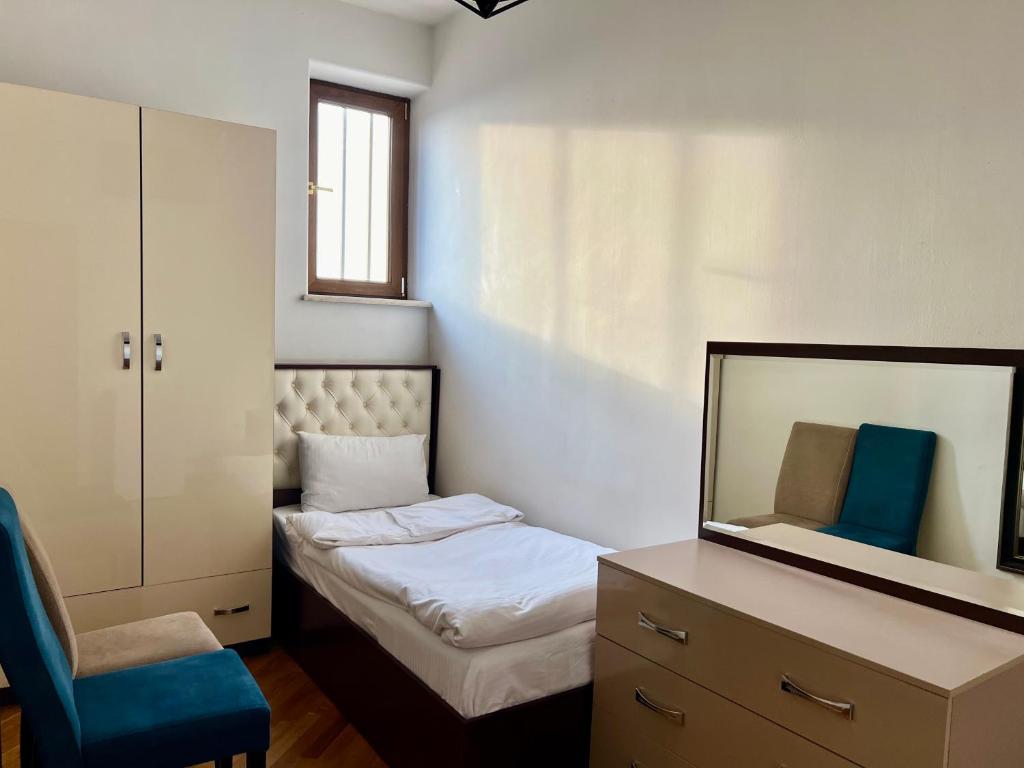 Voodi või voodid majutusasutuse Family Hotel toas