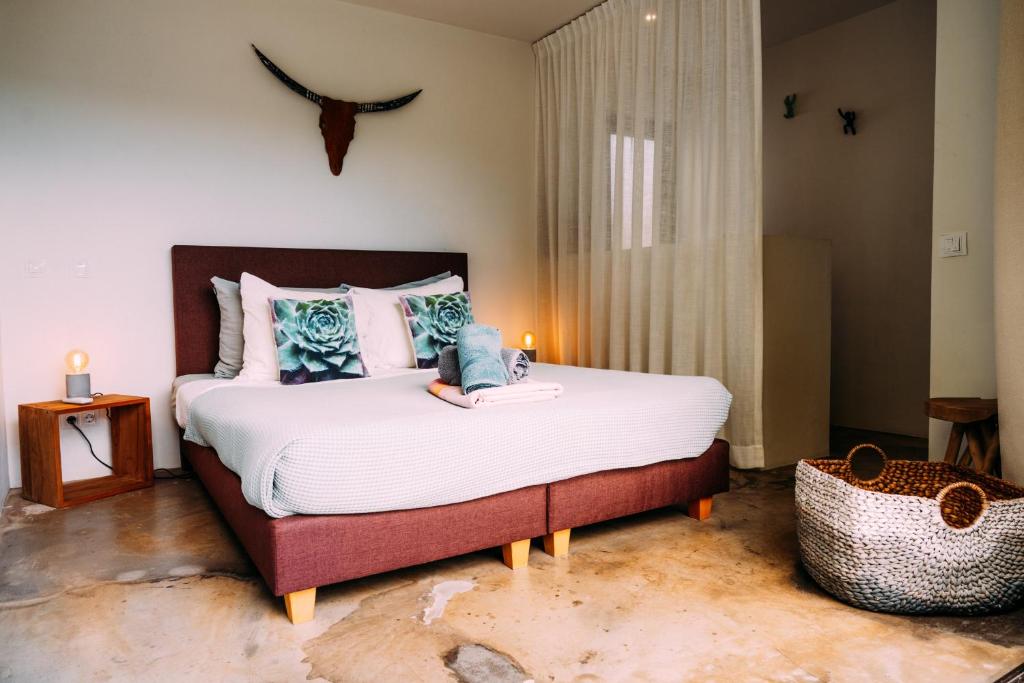 Postel nebo postele na pokoji v ubytování Bohemi Design Villa's
