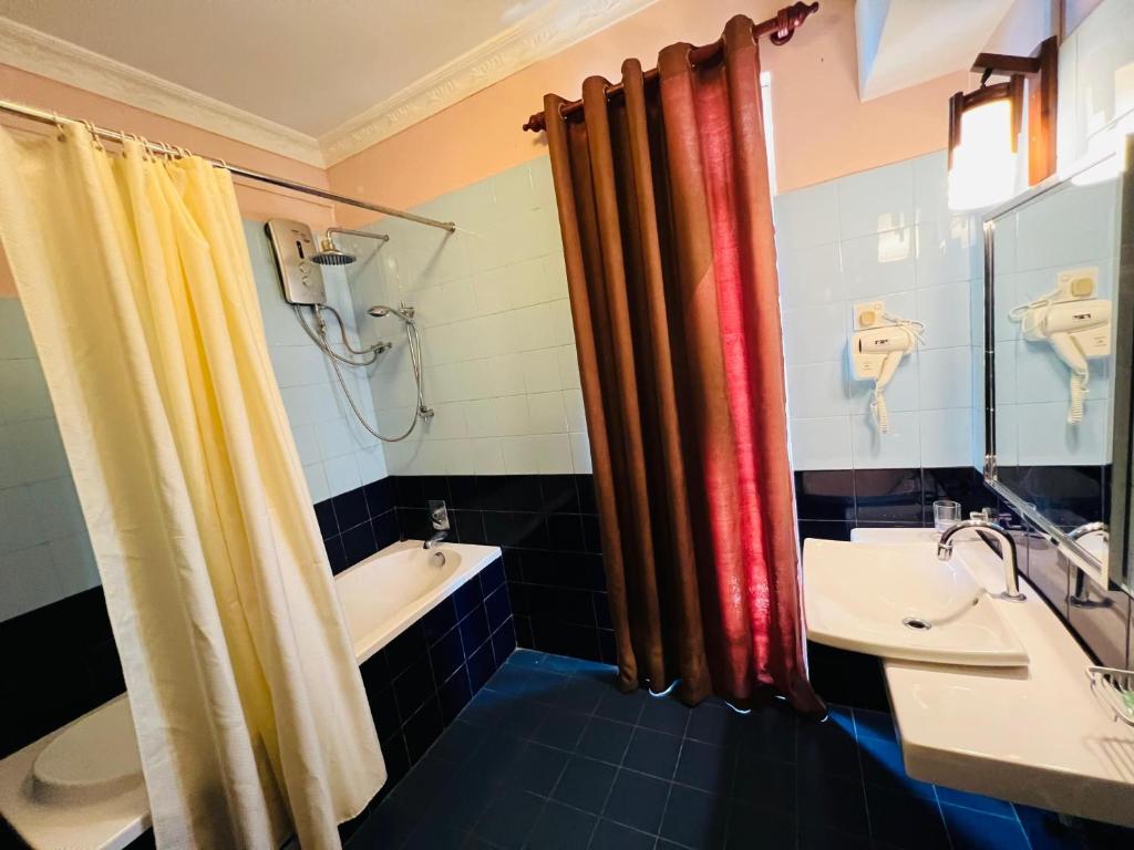 Koupelna v ubytování Lafala Hotel & Service Apartment