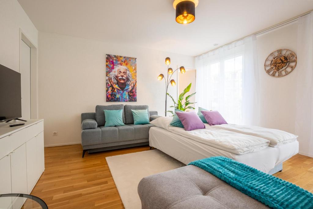 Postel nebo postele na pokoji v ubytování Special EiNSTEiN IIV Apartment, Messe Kleinbasel 10-STAR