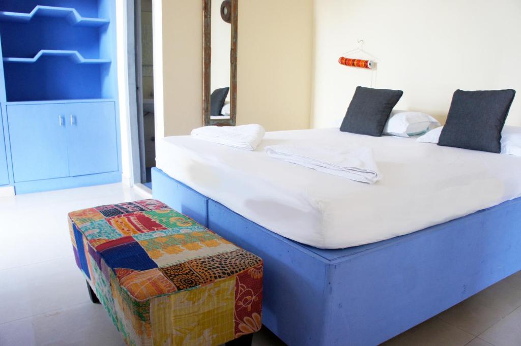 Postel nebo postele na pokoji v ubytování Bed & Chai Guesthouse