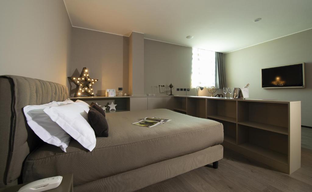 TV a/nebo společenská místnost v ubytování H2C Hotel Milanofiori