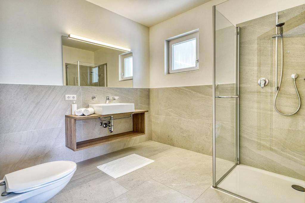 Koupelna v ubytování Das Mitterplarser Hotel