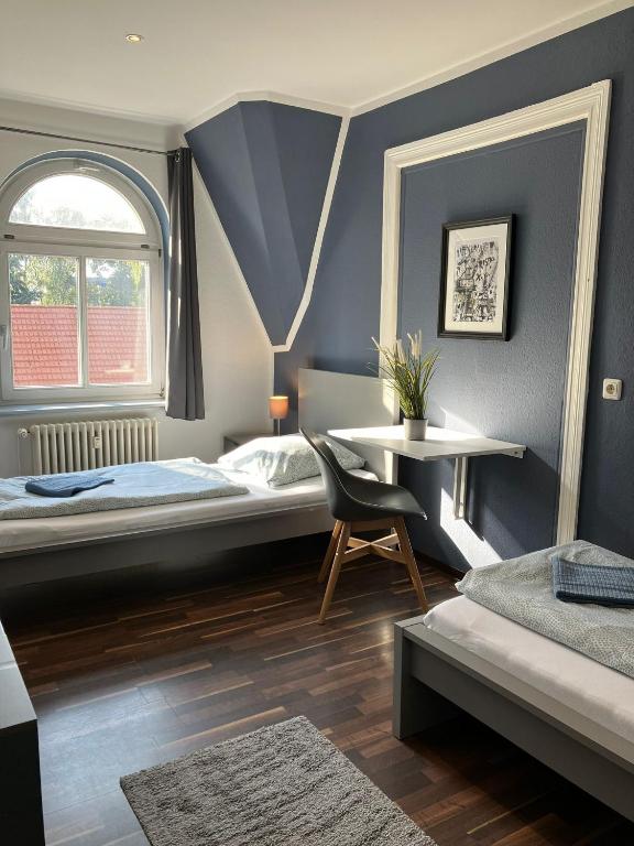 Postel nebo postele na pokoji v ubytování Blue Doors Hostel Altstadt