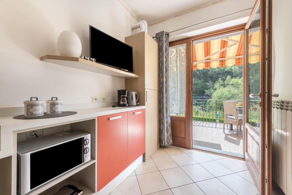 Kuchyň nebo kuchyňský kout v ubytování Residence Tatiana A3