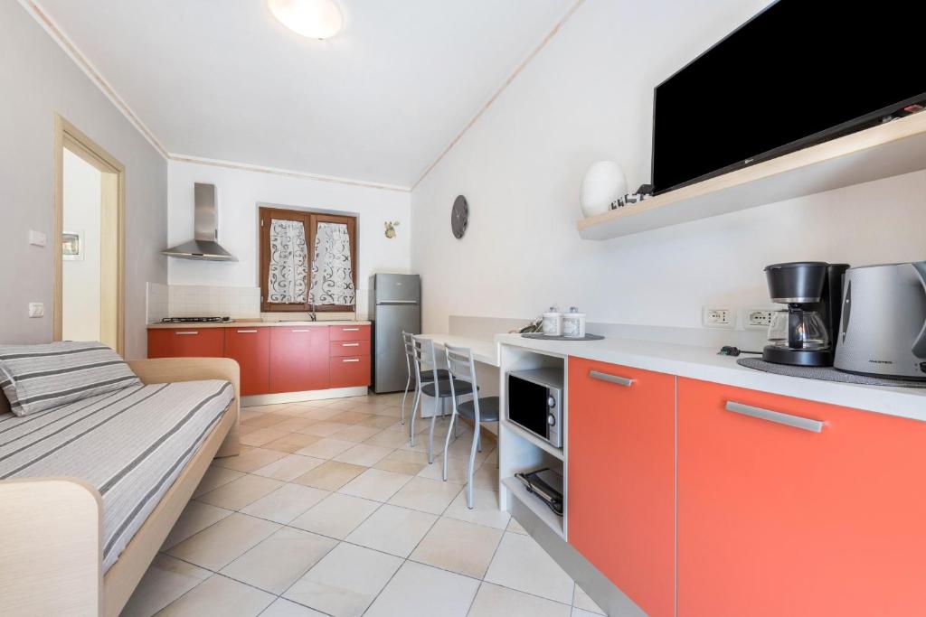 Kuchyň nebo kuchyňský kout v ubytování Residence Tatiana A3