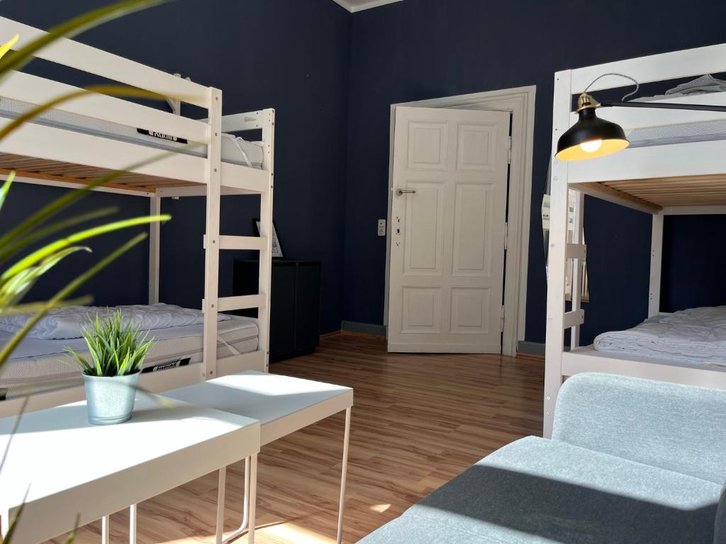 Postel nebo postele na pokoji v ubytování Blue Doors Hostel Altstadt