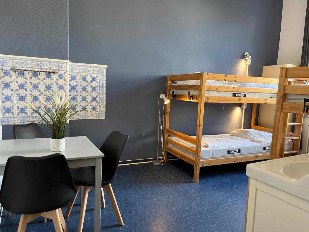 Postel nebo postele na pokoji v ubytování Blue Doors Hostel Altstadt