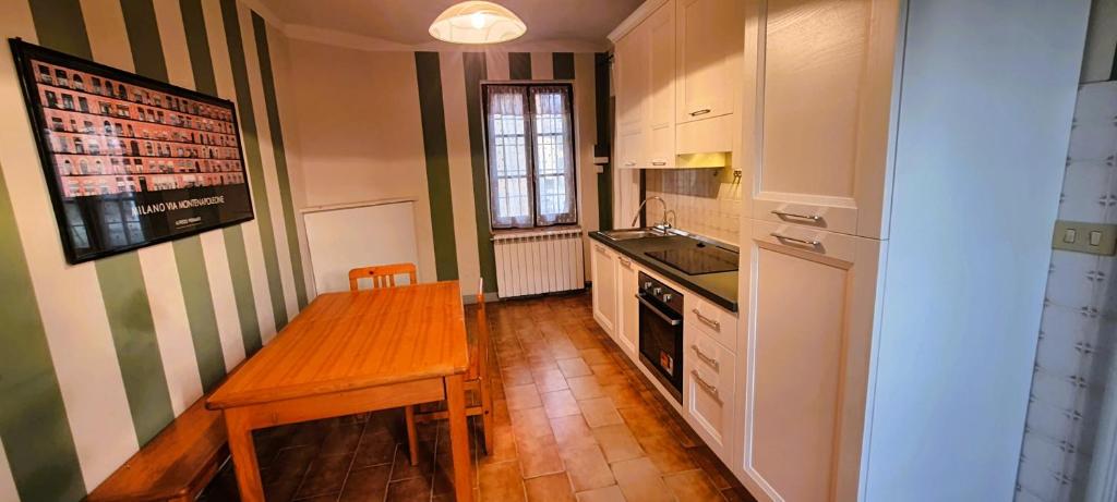 Kuchyň nebo kuchyňský kout v ubytování AGRITURISMO LE CORTI DELLA GUALDANA