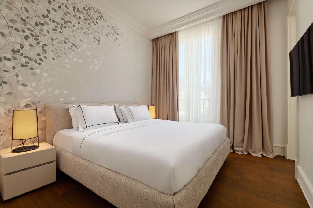 Postel nebo postele na pokoji v ubytování Boutique Hotel Porto Palace