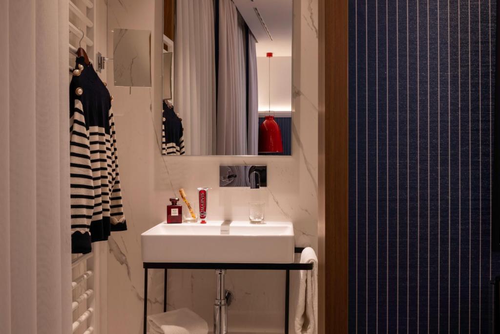Koupelna v ubytování Hotel D Geneva