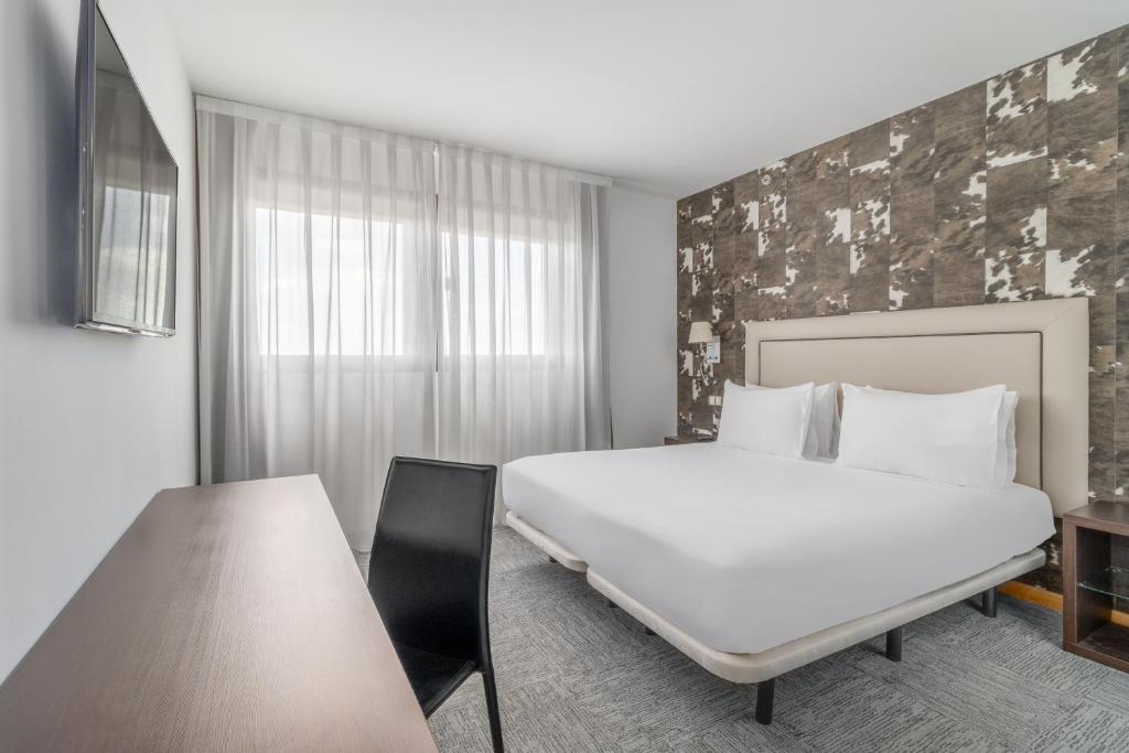 Cama o camas de una habitación en Exe Convention Plaza Madrid
