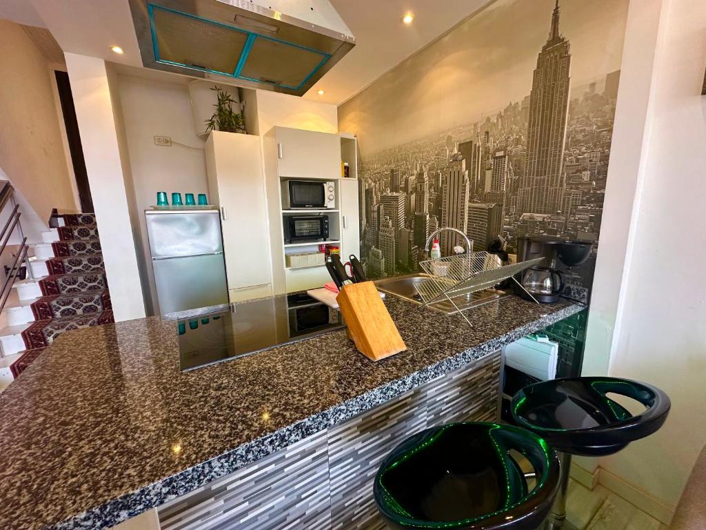 A kitchen or kitchenette at Top DUPLEX-DELUXE APPARTEMENT-ALBATROS