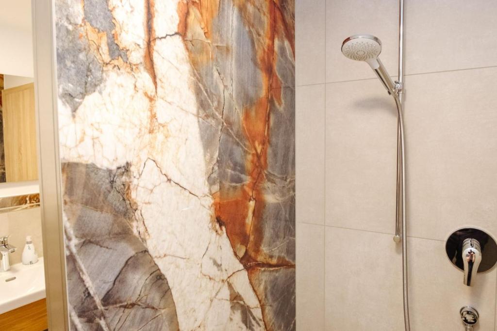 Koupelna v ubytování Hotel Sixt