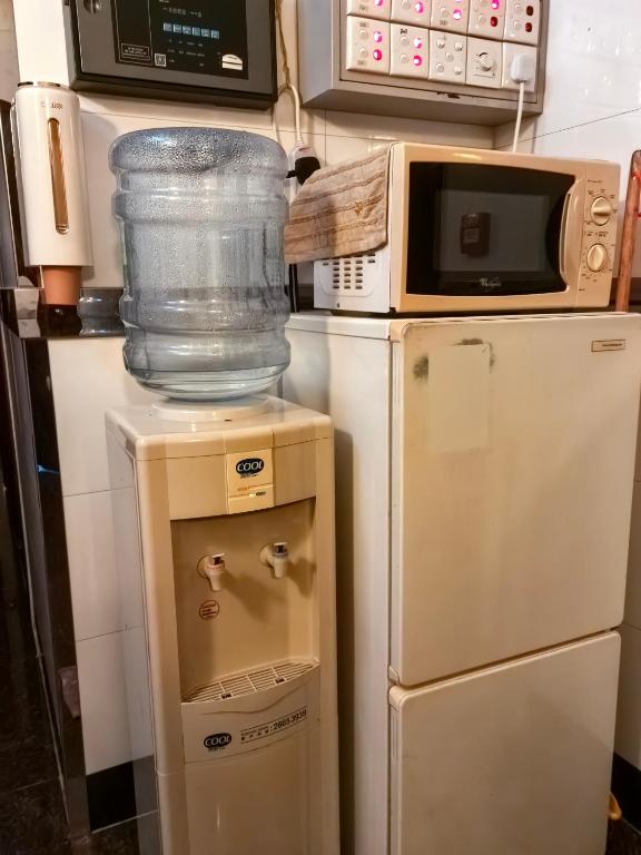 Eldhús eða eldhúskrókur á Jinnsti Guesthouse 景士迪宾馆