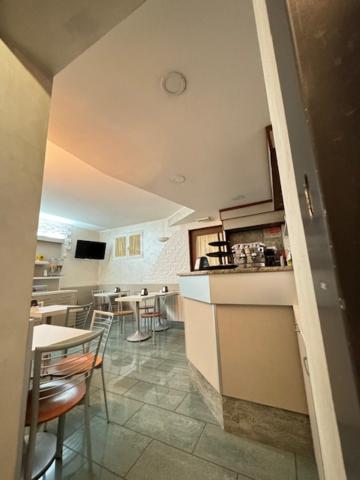 Kuchyň nebo kuchyňský kout v ubytování Hotel Le Querce