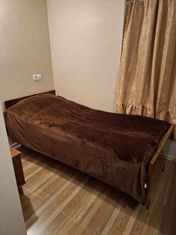 Postel nebo postele na pokoji v ubytování Lux-2-or-1- persons Irodion Evdoshvili Street #15