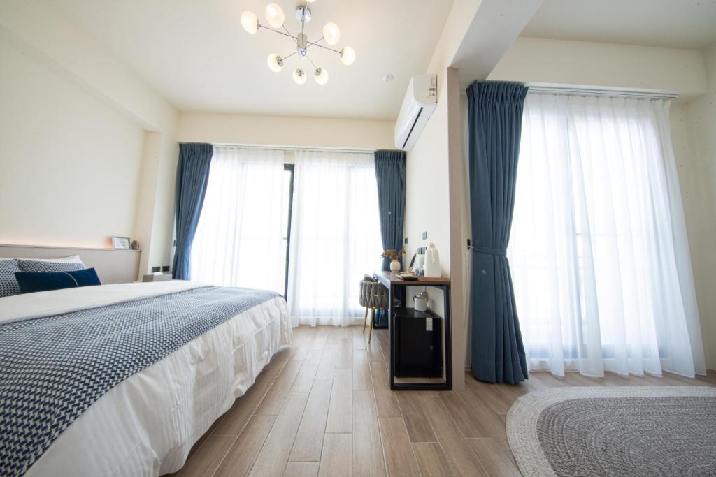 Postel nebo postele na pokoji v ubytování 沐暮MooMoo