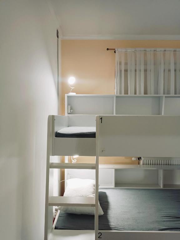 Postel nebo postele na pokoji v ubytování Hostel Central Skopje