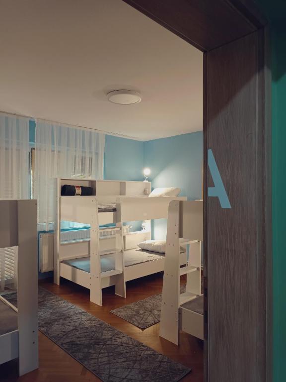 Postel nebo postele na pokoji v ubytování Hostel Central Skopje