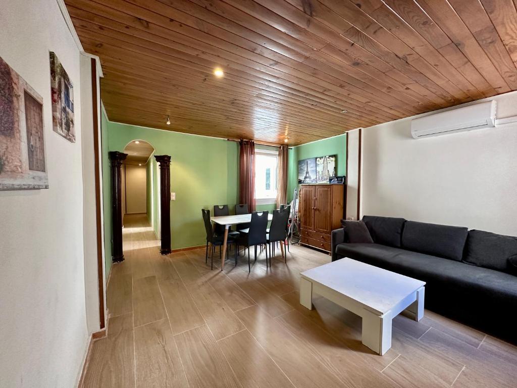 a living room with a couch and a table at Spanish style flat close to center in Alicante