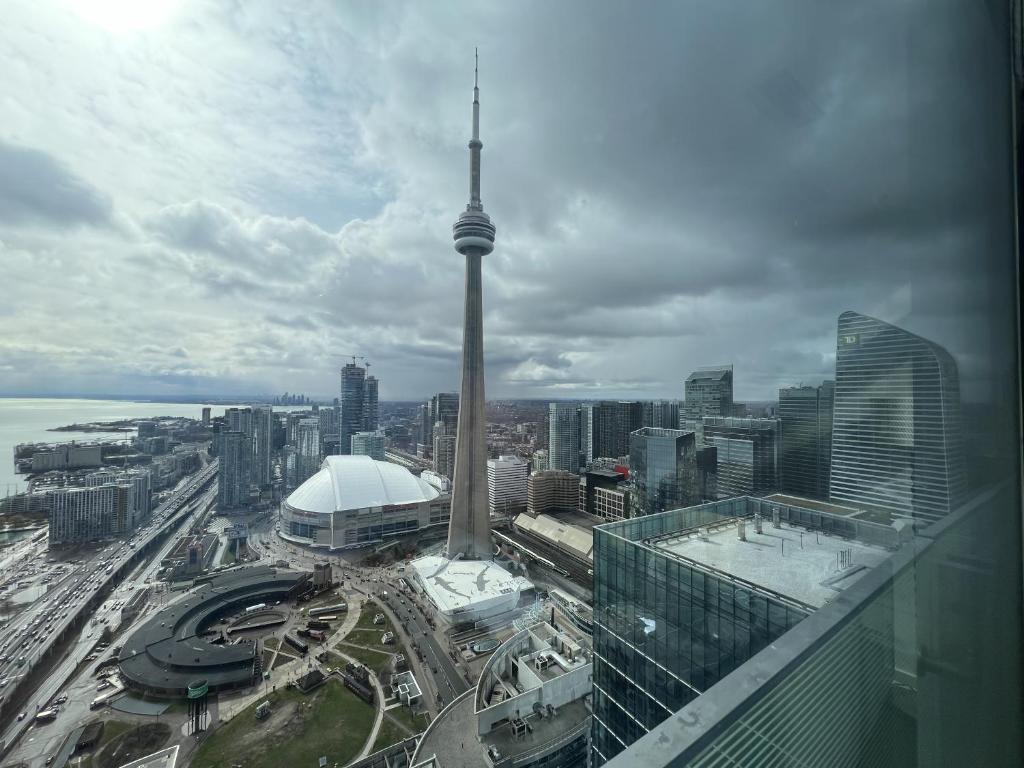 a view of the cn tower from the top of a building at Prime Stay Suites in Toronto