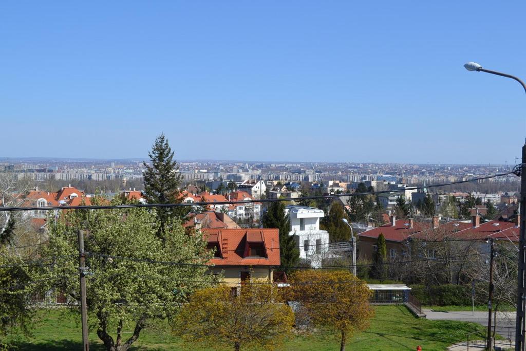 a view of a city with houses and buildings at Toboz41apartman in Budapest