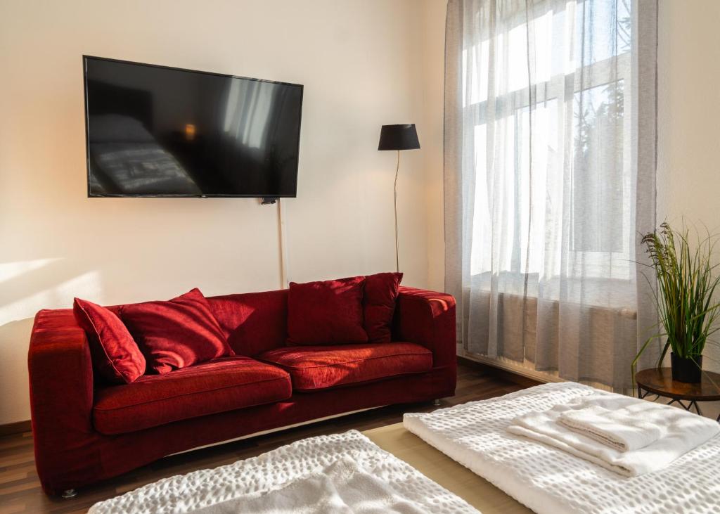 Μια τηλεόραση ή/και κέντρο ψυχαγωγίας στο Apartmenthaus Rankestraße 4