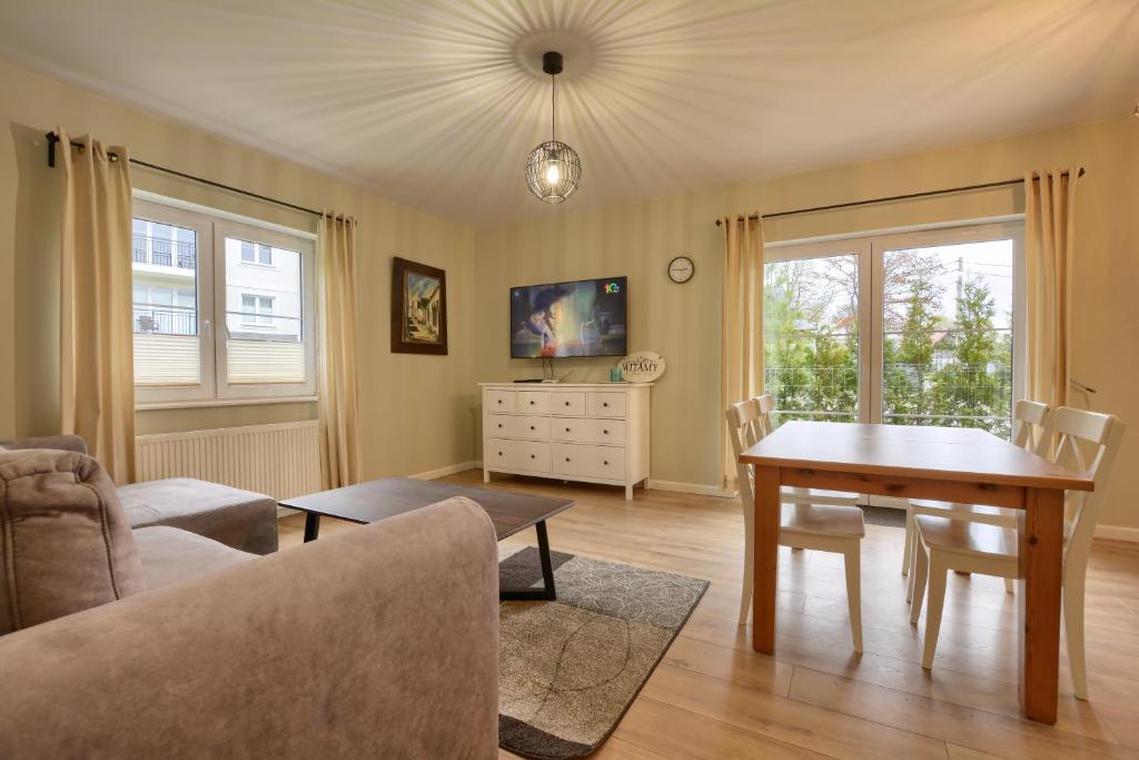 TV a/nebo společenská místnost v ubytování Apartament NavyBlue z widokiem na góry
