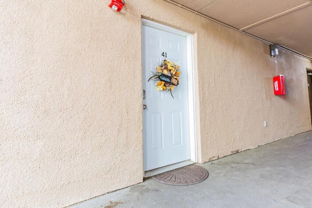 a door to a building with a wreath on it at Check it out! 2 BR/ 1 B Apt very close to 1-24 in Chattanooga