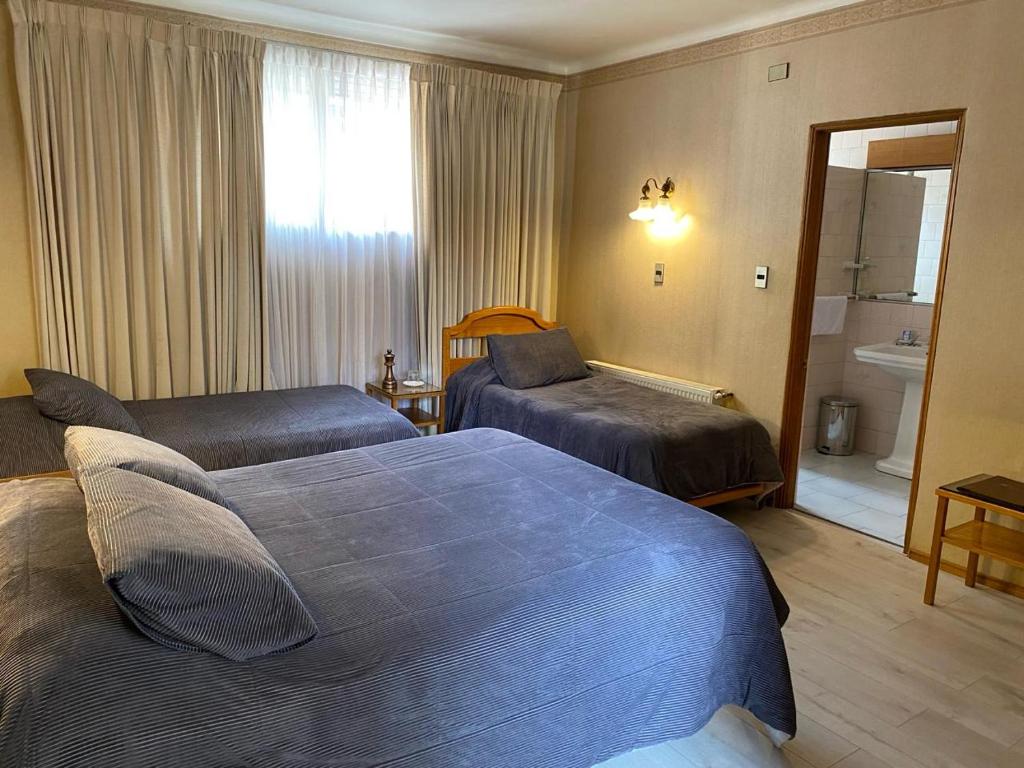 Cama o camas de una habitación en Hotel Libertador Bernardo O´Higgins