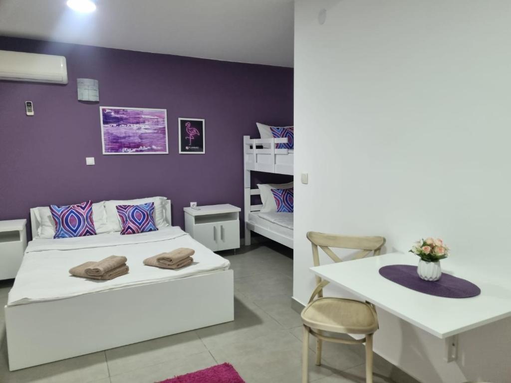 Postel nebo postele na pokoji v ubytování Flamingo Resort